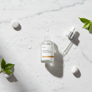 iUNIK Black Snail Restore Serum Flat Lay