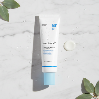 Medicube Zero Pore Sun Serum Flat Lay